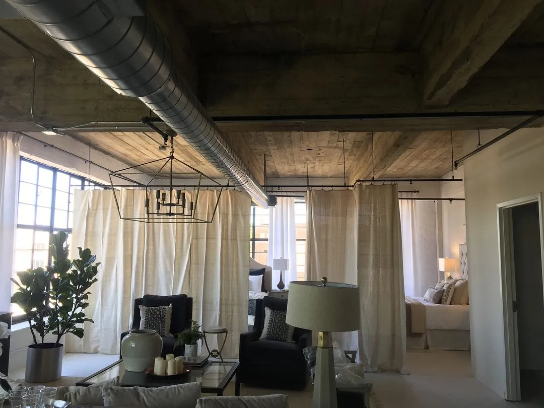 Curtain and drapery installation in a Birmingham loft living area